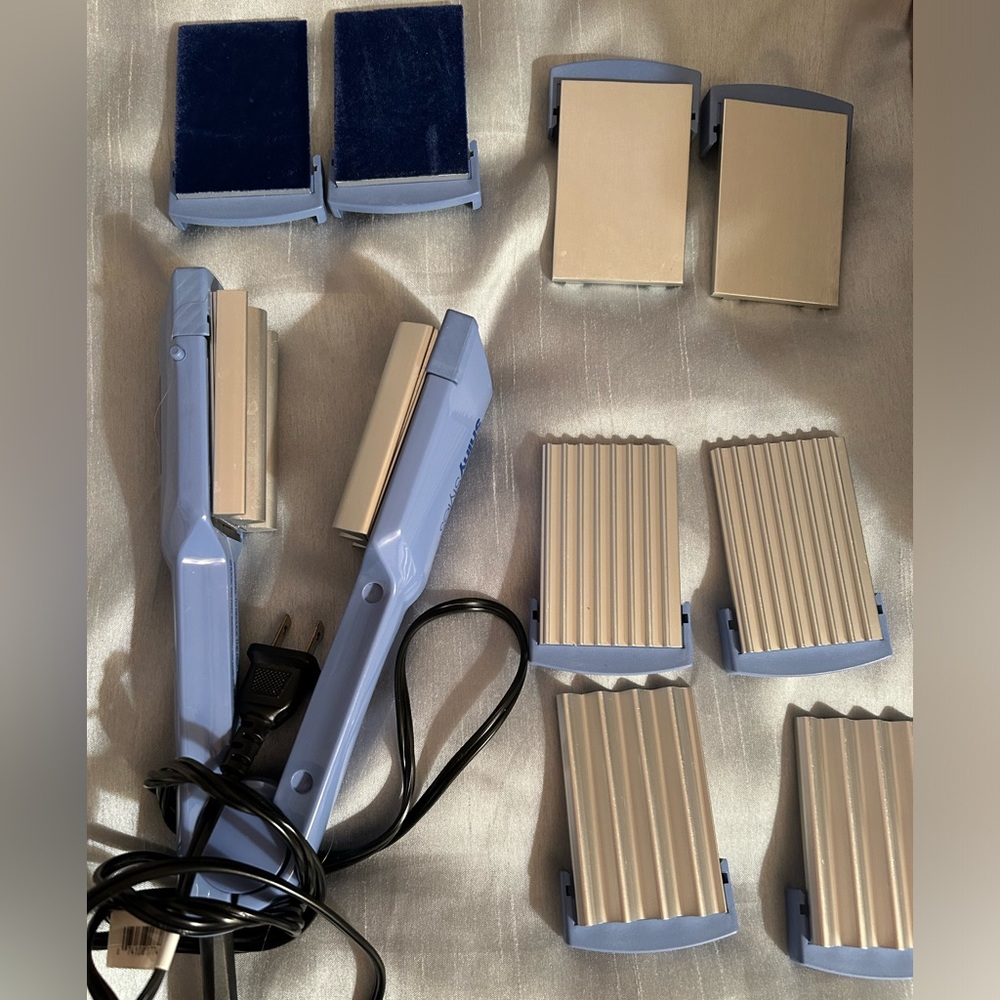 Conair shiny styling tool.  Comes with five interchangeable plates.